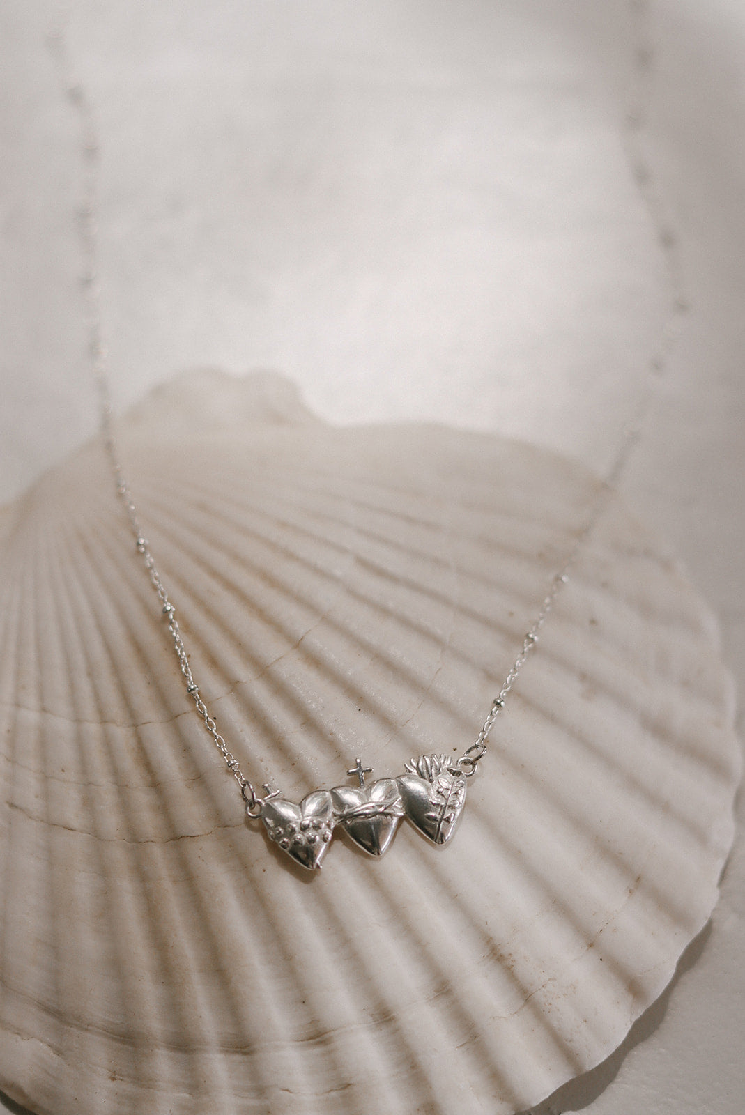 Sacred Hearts of the Holy Family Necklace in Sterling Silver