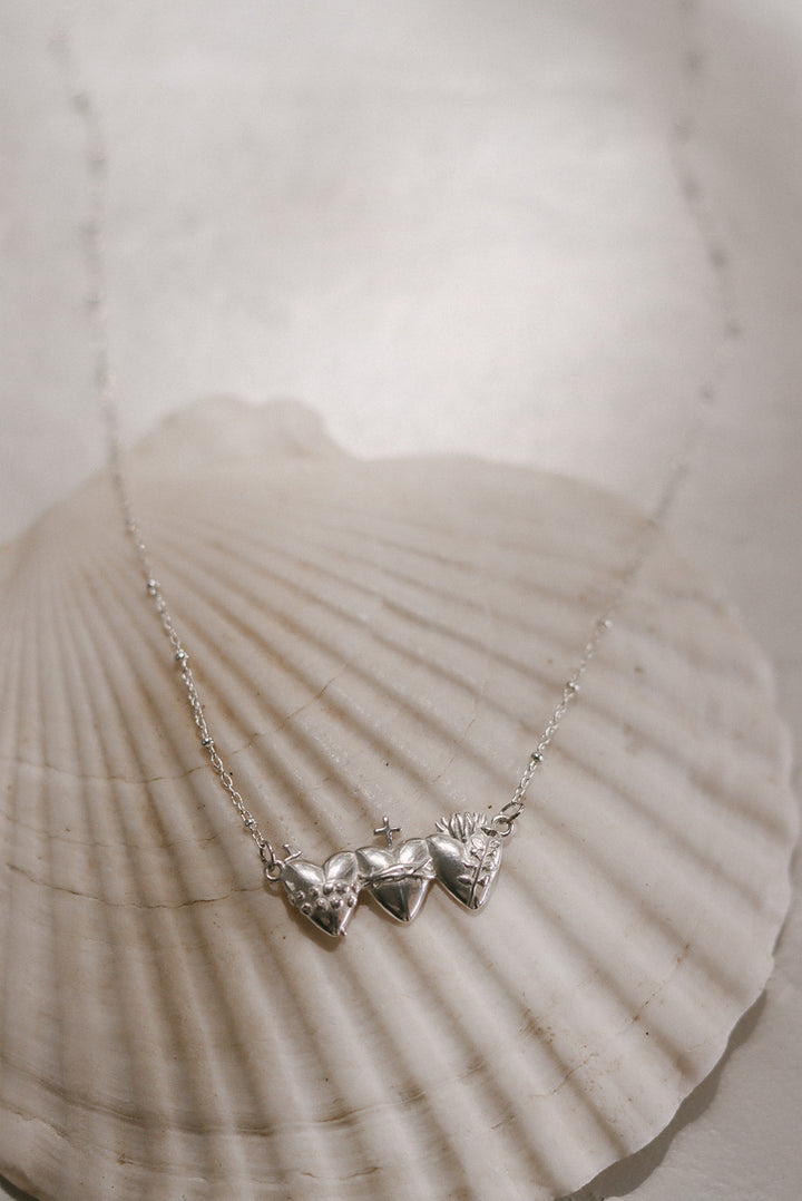 Sacred Hearts of the Holy Family Necklace in Sterling Silver