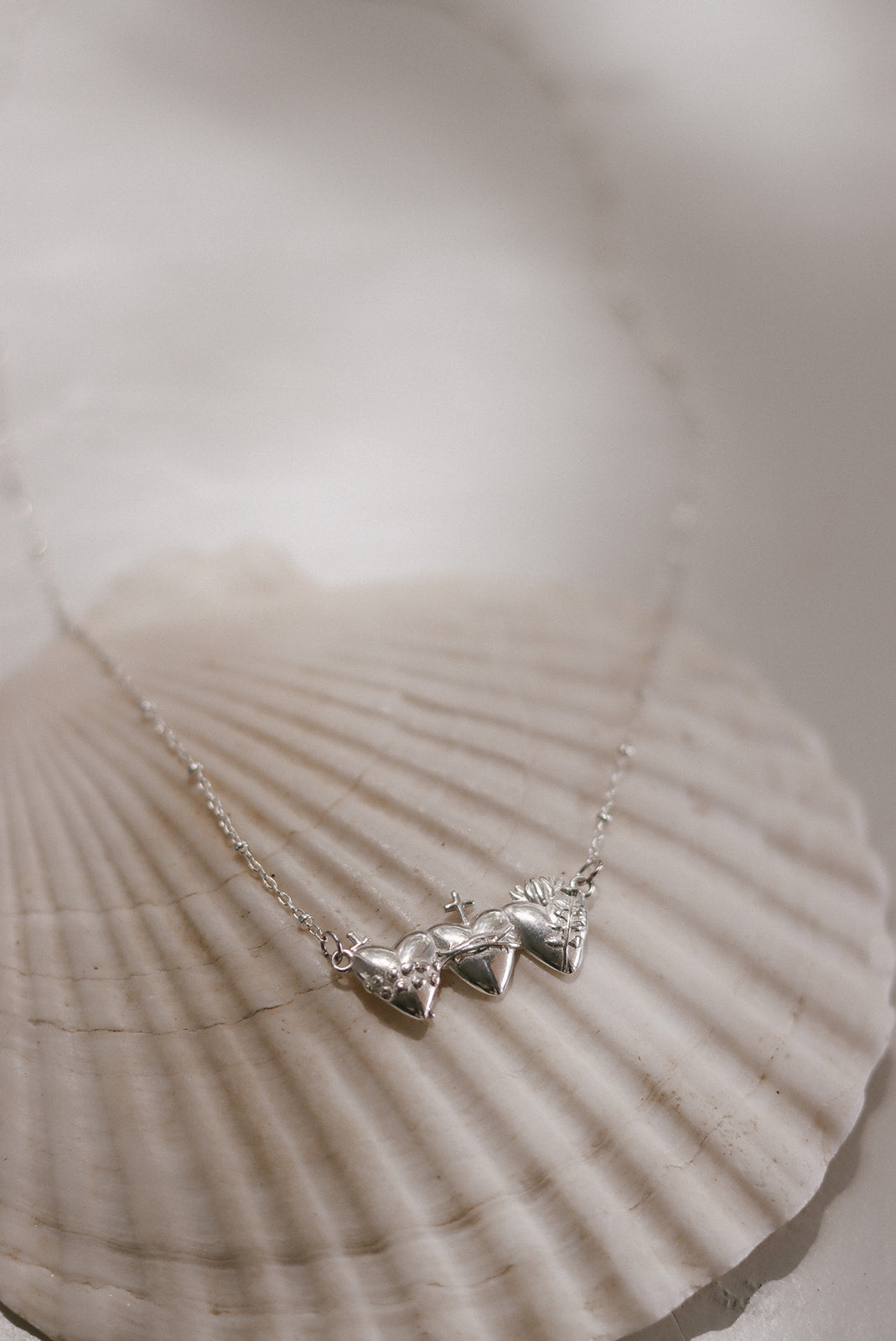 Sacred Hearts of the Holy Family Necklace in Sterling Silver