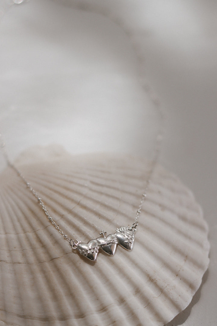 Sacred Hearts of the Holy Family Necklace in Sterling Silver