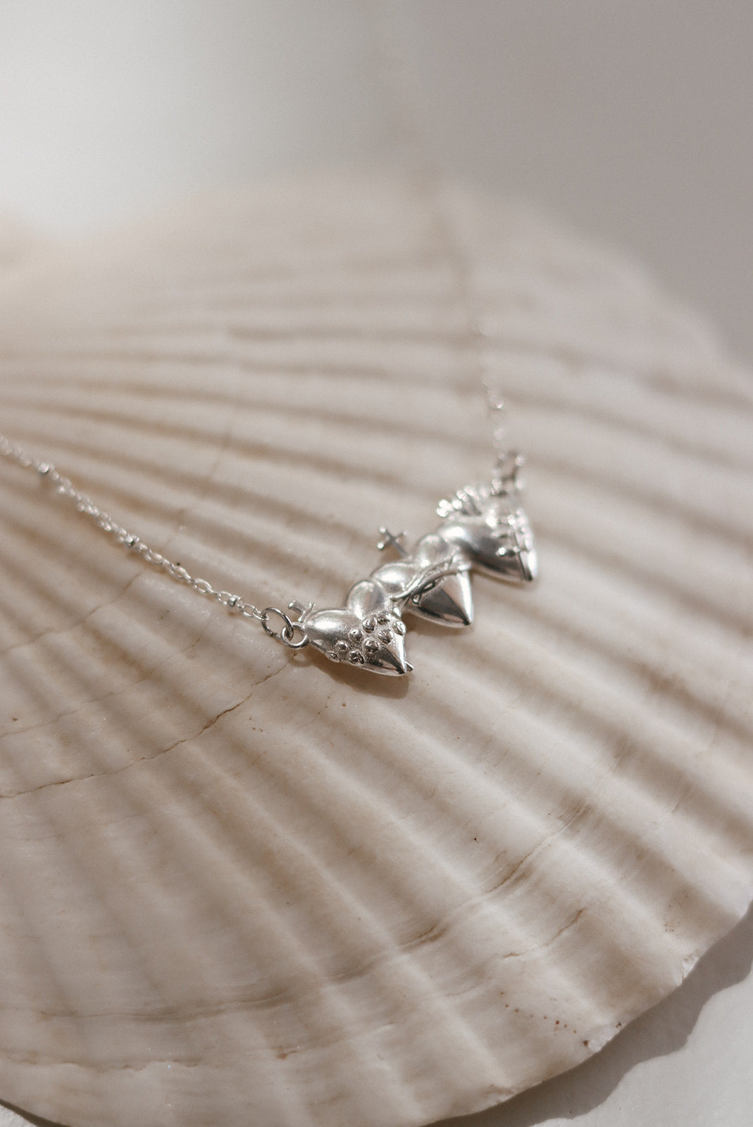 Sacred Hearts of the Holy Family Necklace in Sterling Silver