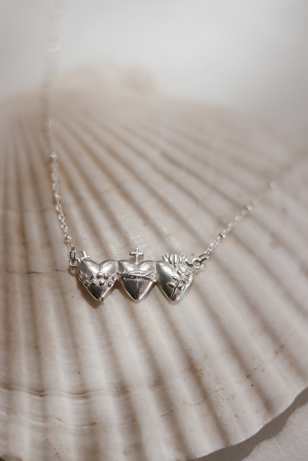 Sacred Hearts of the Holy Family Necklace in Sterling Silver