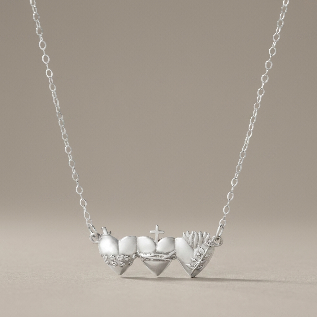 Sacred Hearts of the Holy Family Necklace in Sterling Silver greige