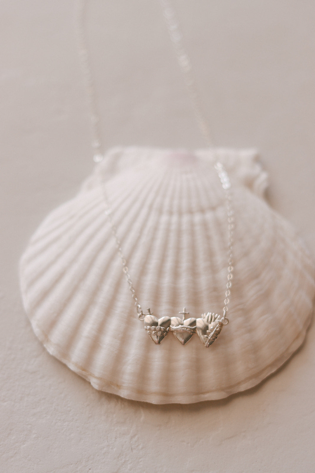 Sacred Hearts of the Holy Family Necklace in Sterling Silver